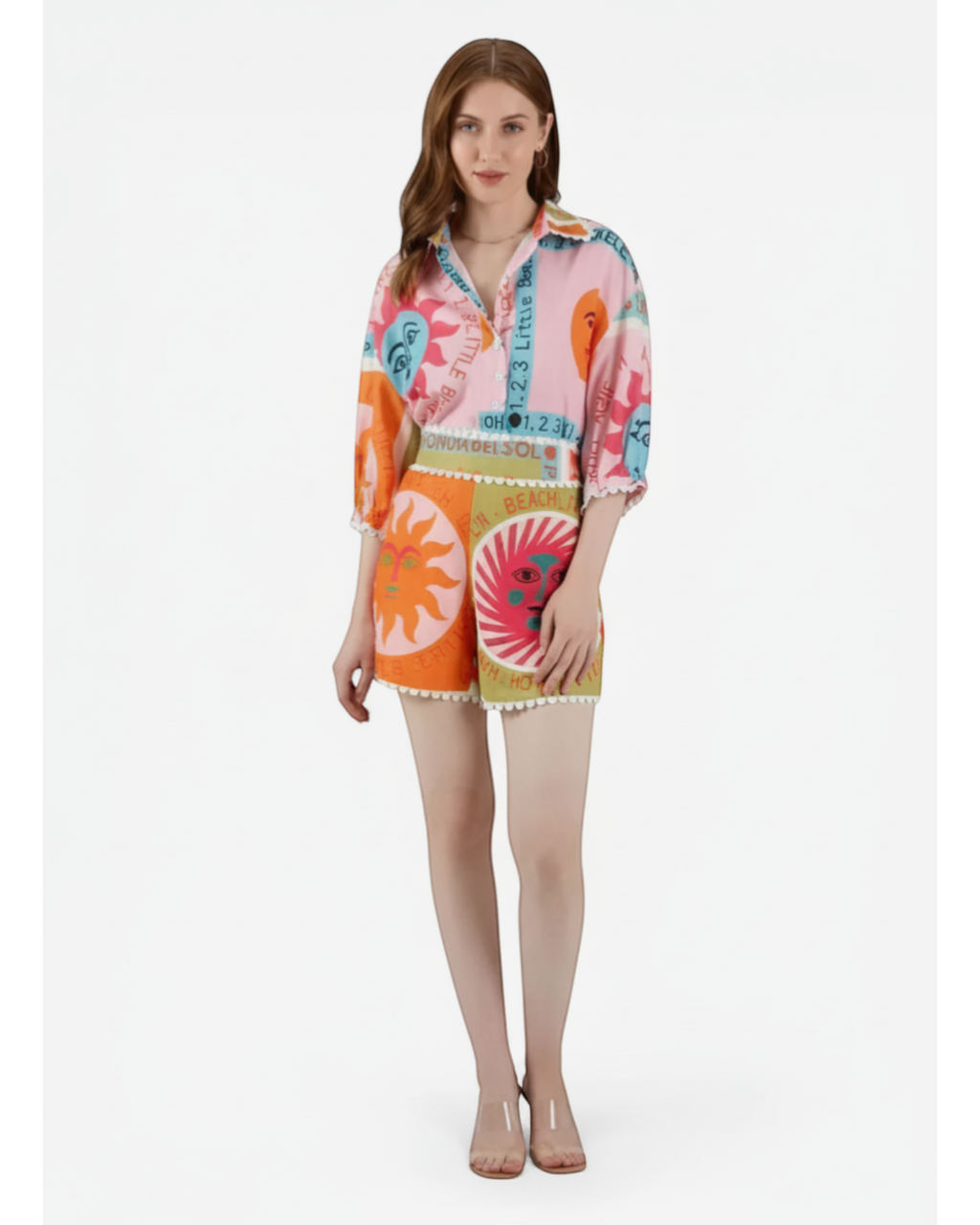 ANNYS colorful sun and face print two-piece set with scalloped hem shorts and button-up shirt.