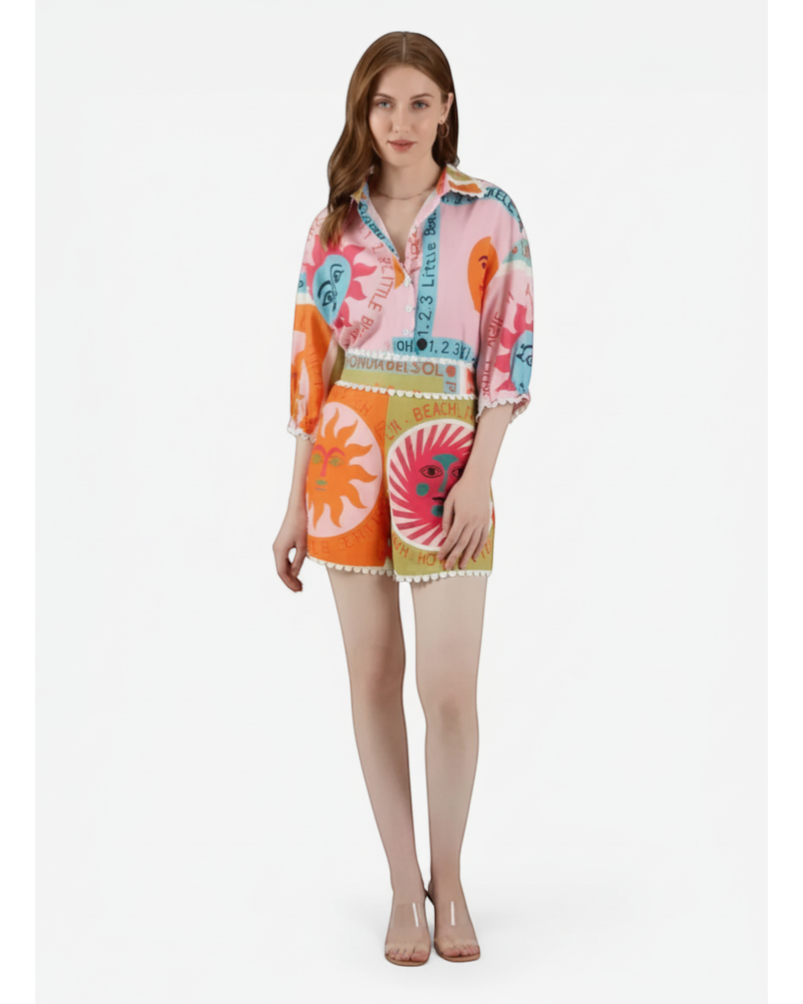 ANNYS colorful sun and face print two-piece set with scalloped hem shorts and button-up shirt.